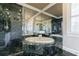 Luxurious marble bathroom featuring a large soaking tub, walk-in shower, and mirrored walls at 3 Demorest Ne Ave, Atlanta, GA 30305