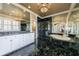 Elegant primary bathroom featuring a soaking tub, walk-in shower, and dual sink vanity at 3 Demorest Ne Ave, Atlanta, GA 30305