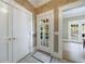 Charming entryway leads to a bright interior with a view of the landscaped yard through the glass doors at 3 Demorest Ne Ave, Atlanta, GA 30305