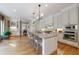 Modern kitchen with granite countertops, stainless steel appliances, and hardwood floors throughout at 3 Demorest Ne Ave, Atlanta, GA 30305