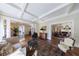 Spacious living room with hardwood floors and view into the dining area with chandelier at 3 Demorest Ne Ave, Atlanta, GA 30305