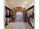 Spacious walk-in closet with custom shelving and cabinet storage providing ample space for organization at 3 Demorest Ne Ave, Atlanta, GA 30305