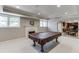 Finished basement featuring a fireplace, a pool table, and an open floor plan with recessed lighting at 3284 Bakers Mill Ct, Dacula, GA 30019