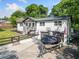 Charming exterior view featuring a boat on the drive, a well-manicured yard and a 2-car garage at 369 Arnold Mill Rd, Woodstock, GA 30188
