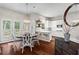 Eat-in kitchen includes stainless appliances, ample counter space, and bright lighting at 4592 Planters Hill Dr, Powder Springs, GA 30127