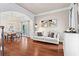 Cozy living room with hardwood floors, modern furniture, and stylish decor at 4592 Planters Hill Dr, Powder Springs, GA 30127