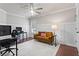 This comfortable home office features board and batten and a plush sitting area at 4592 Planters Hill Dr, Powder Springs, GA 30127
