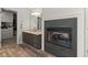 Bathroom features double sinks, granite counters, and a fireplace at 5620 Preserve Cir, Johns Creek, GA 30005
