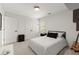 Comfortable bedroom with guitar, simple design and closet at 5620 Preserve Cir, Johns Creek, GA 30005