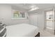 Bright bedroom with a large closet and ensuite bathroom, creating a comfortable and private retreat at 5620 Preserve Cir, Johns Creek, GA 30005