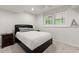 Bright bedroom with a comfortable bed, window and side tables, perfect for relaxation at 5620 Preserve Cir, Johns Creek, GA 30005