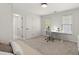 This bedroom features a desk and two windows at 5620 Preserve Cir, Johns Creek, GA 30005