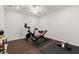 Spacious exercise room featuring workout equipment and ample space for a complete at-home fitness experience at 5620 Preserve Cir, Johns Creek, GA 30005