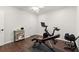 Well-lit exercise room with workout equipment and enough space for an at-home gym at 5620 Preserve Cir, Johns Creek, GA 30005