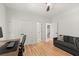 Office space with hardwood floors, modern desk, closet and access to hallway at 5620 Preserve Cir, Johns Creek, GA 30005