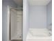 This bathroom has a separate shower and bathtub at 5654 Lawley Dr, Alpharetta, GA 30022