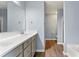 Bathroom with double sink, vanity and white countertop at 5654 Lawley Dr, Alpharetta, GA 30022