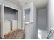 Upstairs laundry area features modern appliances and a neutral color scheme at 5654 Lawley Dr, Alpharetta, GA 30022