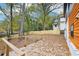 Spacious backyard deck with cable railing overlooking fenced yard at 2396 Sunset Ne Dr, Atlanta, GA 30345