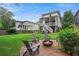 Serene backyard with a fire pit and ample seating, perfect for outdoor gatherings at 519 2Nd Ave, Decatur, GA 30030