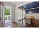 Elegant dining room featuring dark wood floors and views to the front porch at 519 2Nd Ave, Decatur, GA 30030
