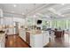 Bright, open kitchen showcases stainless appliances, a granite island, and an easy flow to living space at 519 2Nd Ave, Decatur, GA 30030