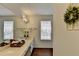 Bathroom with a large mirror, double sinks, and great lighting at 655 Barrington Way, Roswell, GA 30076