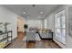 Stylish living room with modern furniture, hardwood floors, and natural light at 655 Barrington Way, Roswell, GA 30076