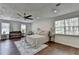 Spacious main bedroom with hardwood floors and ample natural light at 655 Barrington Way, Roswell, GA 30076
