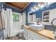 Modern bathroom featuring a white shower curtain, subway tile, and wood countertop at 1188 Cedar Park Cir, Stone Mountain, GA 30083