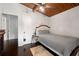 Bright bedroom with a ceiling fan, a wood ceiling, and a large sliding door at 1188 Cedar Park Cir, Stone Mountain, GA 30083