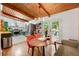 Bright dining area with hardwood floors and French doors leading to the deck at 1188 Cedar Park Cir, Stone Mountain, GA 30083