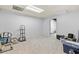Spacious finished basement featuring neutral carpet and a doorway leading to storage at 4257 Edgewater Nw Dr, Kennesaw, GA 30144