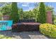 Arden Lake community entrance sign with lush landscaping and brick pillars, creating a welcoming atmosphere for residents at 4257 Edgewater Nw Dr, Kennesaw, GA 30144