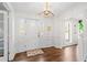 Elegant foyer showcases hardwood floors, classic molding, and a bright entryway at 4257 Edgewater Nw Dr, Kennesaw, GA 30144