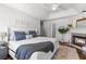 Serene main bedroom with a fireplace, neutral decor, and a king bed at 4257 Edgewater Nw Dr, Kennesaw, GA 30144