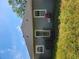 Exterior backyard view of home, showcasing green grass and part of roof at 475 Sw Willard Ave, Atlanta, GA 30310