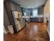 Modern kitchen with stainless steel appliances, sleek gray cabinets, and hardwood flooring at 475 Sw Willard Ave, Atlanta, GA 30310