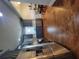 Modern kitchen with stainless steel appliances and gray cabinets at 475 Sw Willard Ave, Atlanta, GA 30310