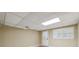 Finished basement with white walls and carpet with access to outside through a white door with window at 3200 Turtle Lake Se Ct, Marietta, GA 30067