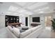 Spacious basement featuring a large sectional, an entertainment center, and a game table at 3370 Habersham Nw Rd, Atlanta, GA 30305
