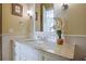 Bathroom with a large vanity, granite counter top, and unique light fixture at 3370 Habersham Nw Rd, Atlanta, GA 30305