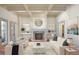 Bright living room with fireplace, coffered ceiling, and modern furniture at 3370 Habersham Nw Rd, Atlanta, GA 30305
