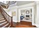 Open-concept living room with staircase and elegant decor at 3370 Habersham Nw Rd, Atlanta, GA 30305