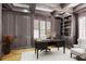 Office with wood paneling, built-in bookshelves, and hardwood floors at 3370 Habersham Nw Rd, Atlanta, GA 30305