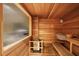 This home features a sauna with wood paneling and a frosted window at 3370 Habersham Nw Rd, Atlanta, GA 30305