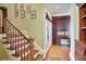 Traditional staircase with hardwood steps and a view of the office space at 3370 Habersham Nw Rd, Atlanta, GA 30305