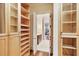 Walk in Closet with hardwood floors and custom built in shelving at 3370 Habersham Nw Rd, Atlanta, GA 30305