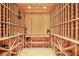Wine cellar with floor-to-ceiling wooden racks and space for storage at 3370 Habersham Nw Rd, Atlanta, GA 30305