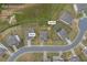 Aerial view of the home's plat overview, lot size, and backyard fire pit at 3510 Meadow Grass Dr, Dacula, GA at 3510 Meadow Grass Dr, Dacula, GA 30019
